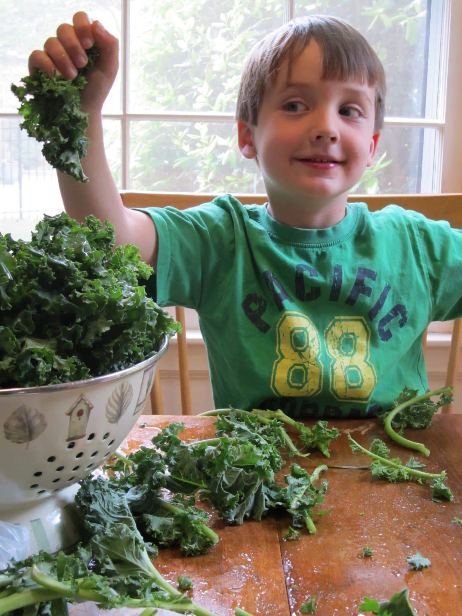 kid stripping kale