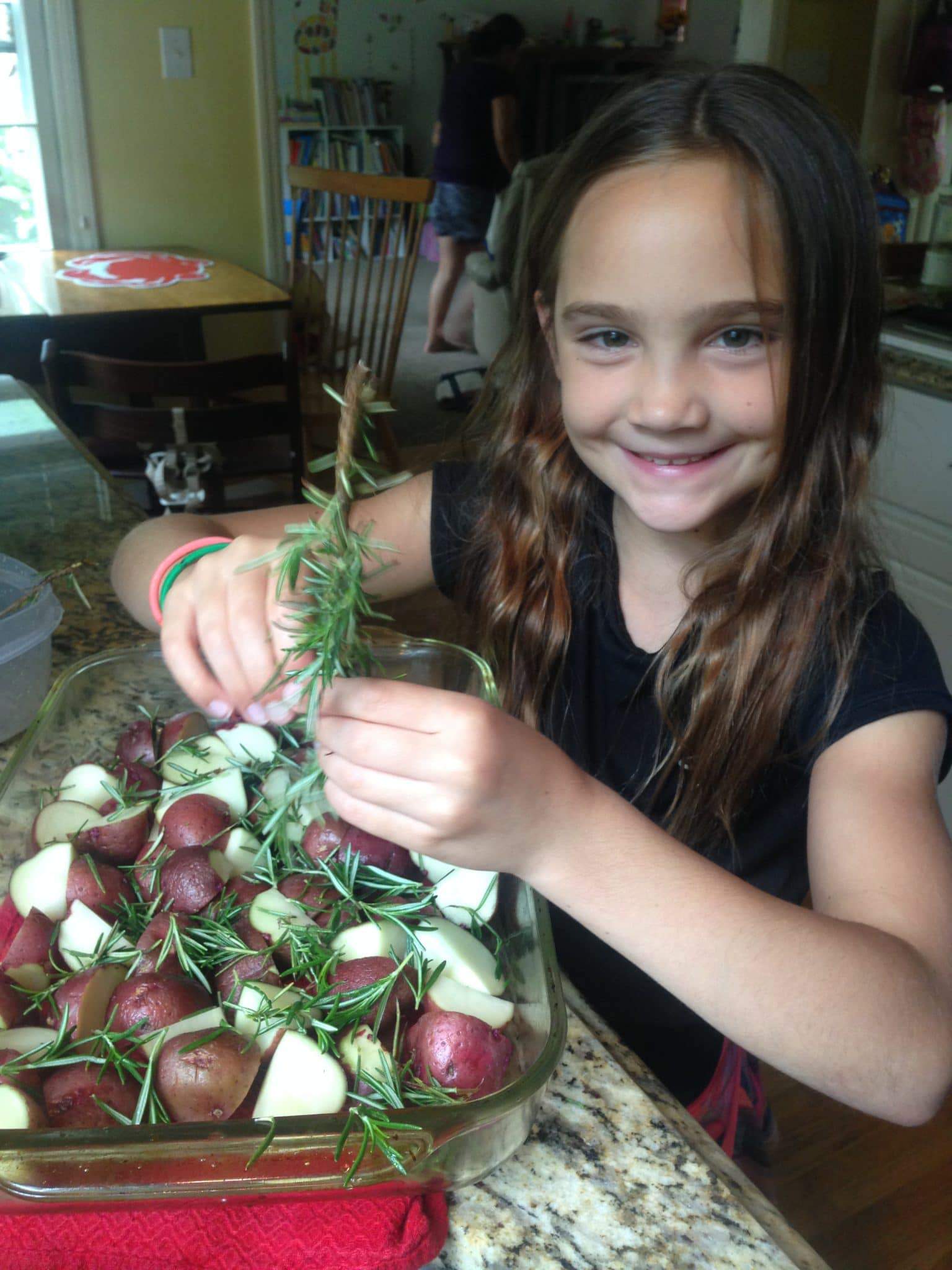 kids in the kitchen julia making potatoes