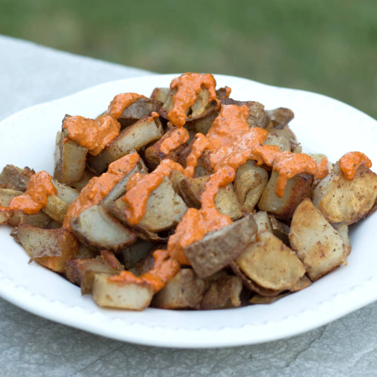 Want an authentic taste of Spain? Make these amazing patatas bravas. Potatoes with a beautiful spicy paprika sauce. 