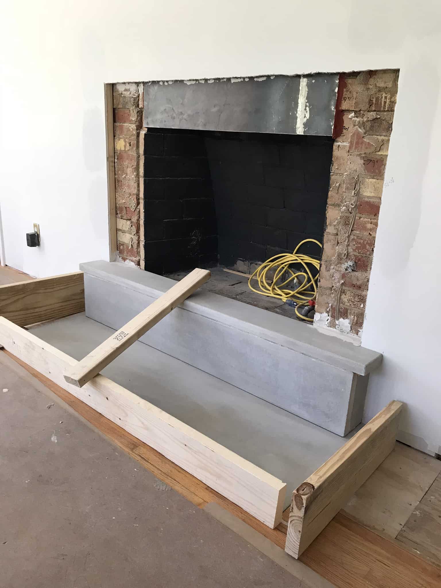 installing the cement fireplace