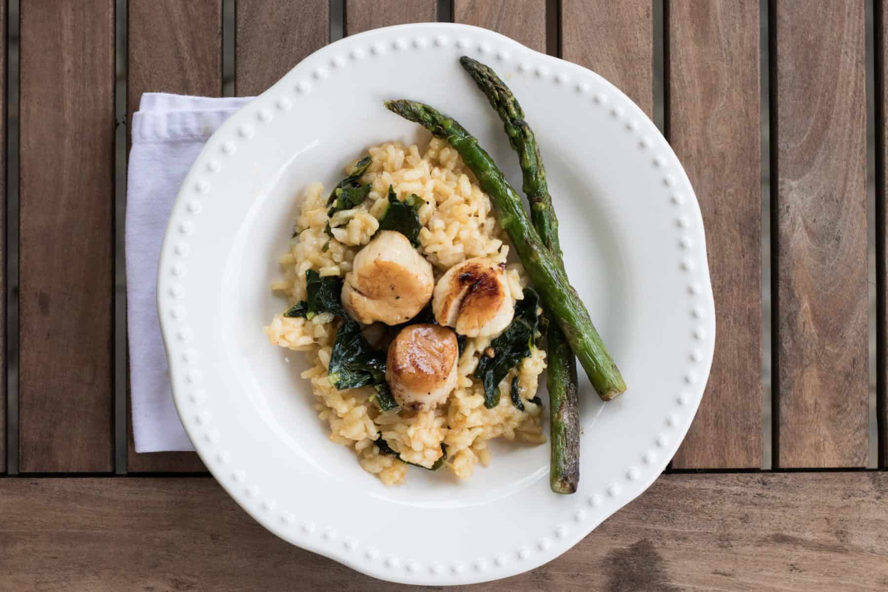 Seared Scallops Over Kale Risotto · Erin Brighton