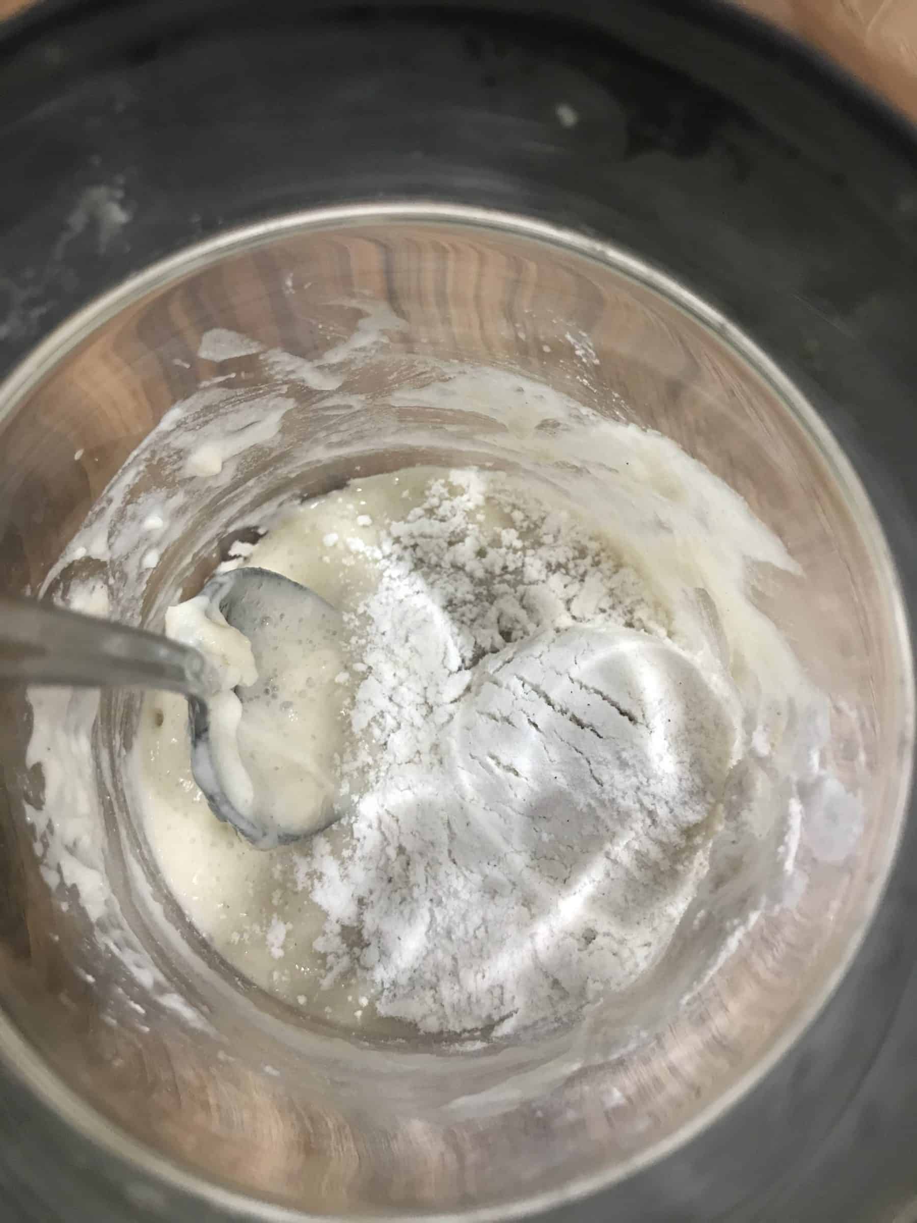 adding flour to my sourdough starter