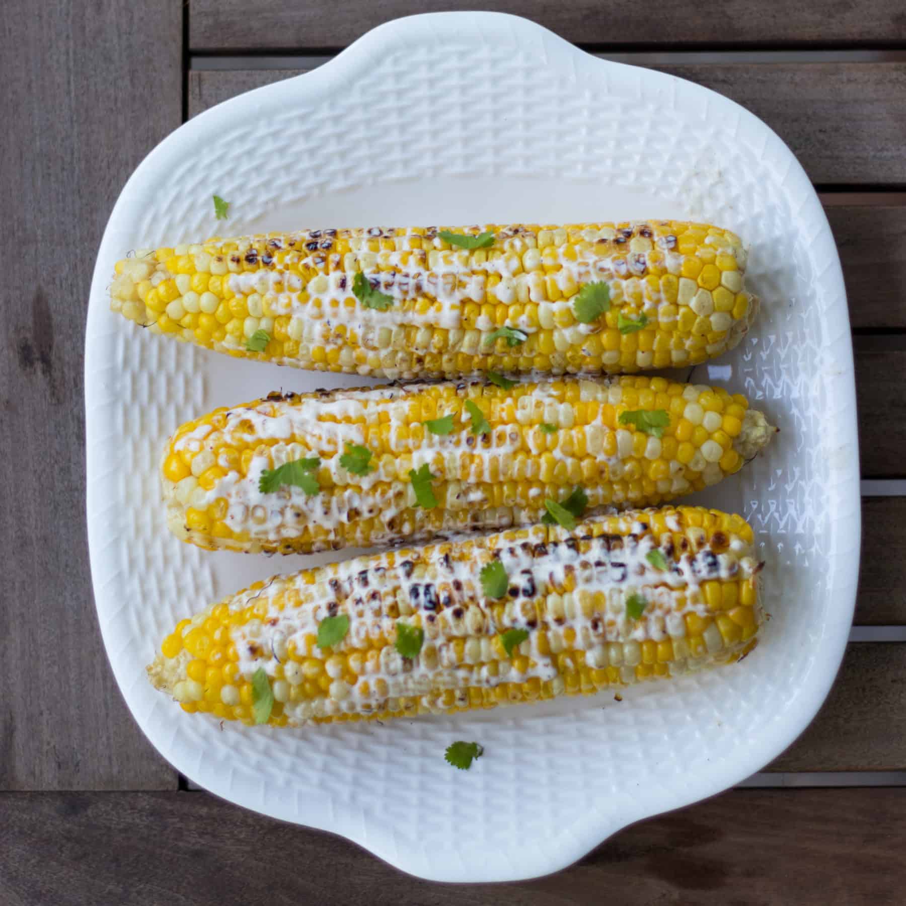 Mexican Grilled Corn on a plate
