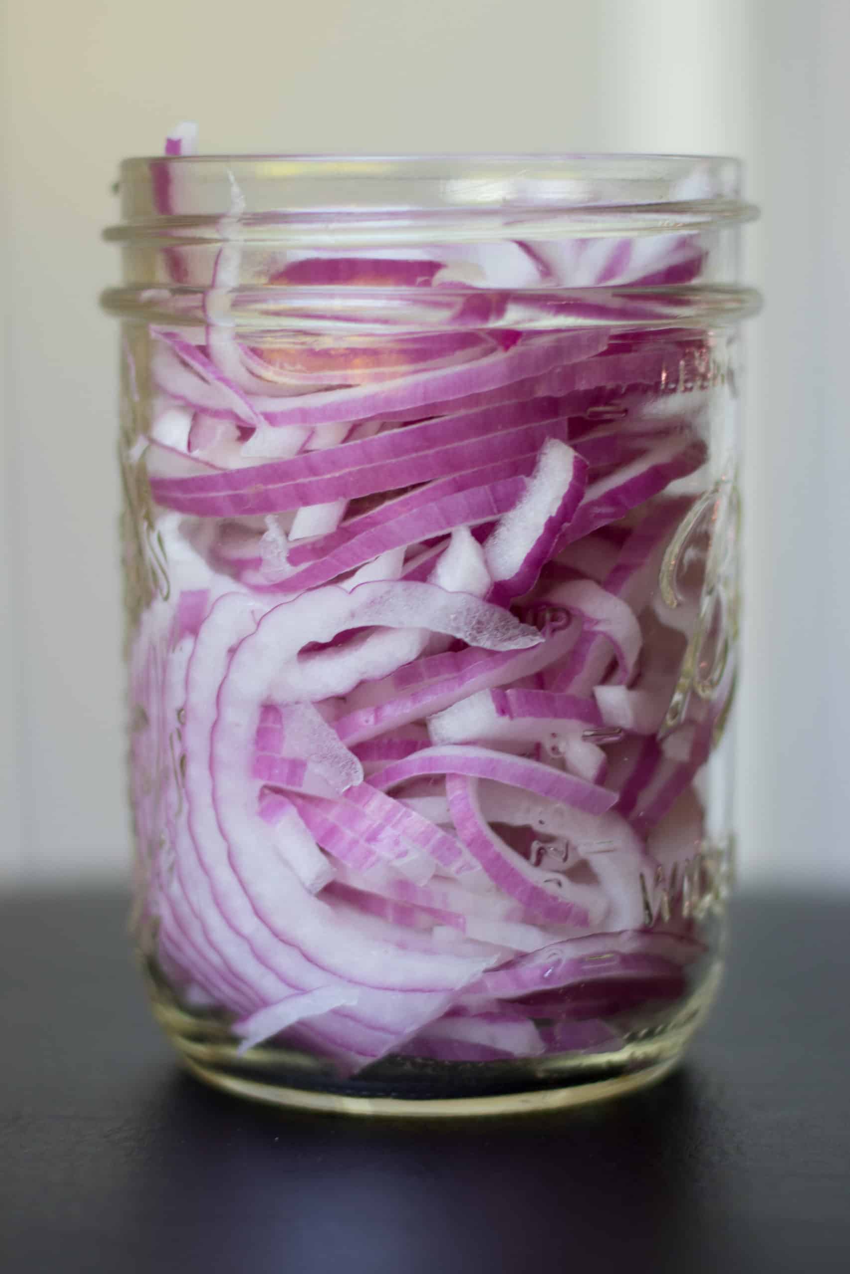 red onions in a jar